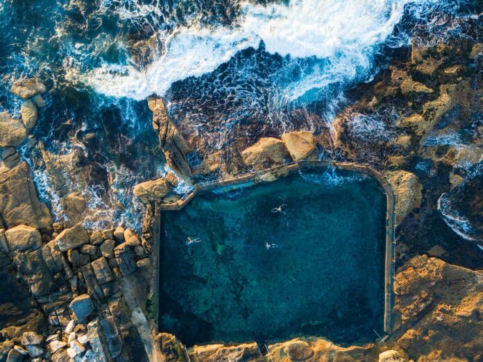 swimming thecon Pick a quieter swim spot or go at a less busy time. Shutterstock