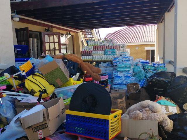 masiphumelele fire volunteers donate at Living Hope centre