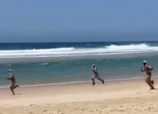 cops-chase-surfer-beach-south-africa