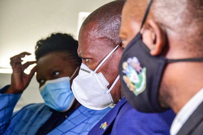 dr mkhize thecon South Africa’s Minister of Health, Dr Zweli Mkhize (centre). The government has been criticised for not having an actionable plan on vaccines. Photo by Darren Stewart/Gallo Images via Getty Images
