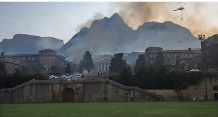 A wildfire spread across the slopes of Table Mountain to the University of Cape Town. Photo by Brenton Geach/Gallo Images via Getty Images A wildfire spread across the slopes of Table Mountain to the University of Cape Town. Photo by Brenton Geach/Gallo Images via Getty Images