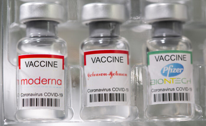 Pfizer-doses-South-Africa-2021-05-02T171631Z_1_LYNXMPEH410AA-OZATP_RTROPTP_4_OZATP-US-HEALTH-CORONAVIRUS-PFIZER-SOUTH-AFRICA-th Vials labelled