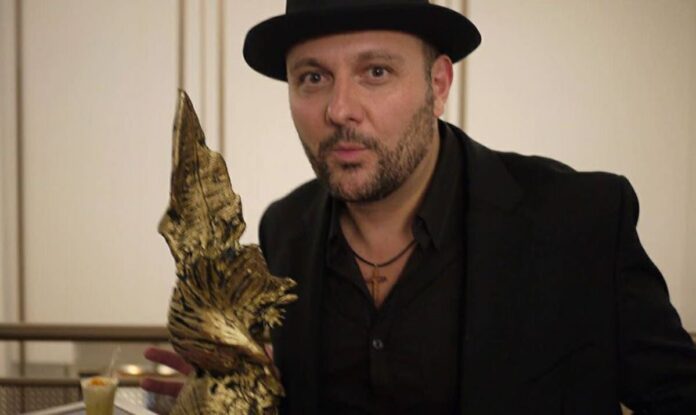Stelio_Savante_San_Diego_Film_Festival_with_Awards_In_Hand._Photo_Credit_Rudolf_Buitendach Stelio_Savante