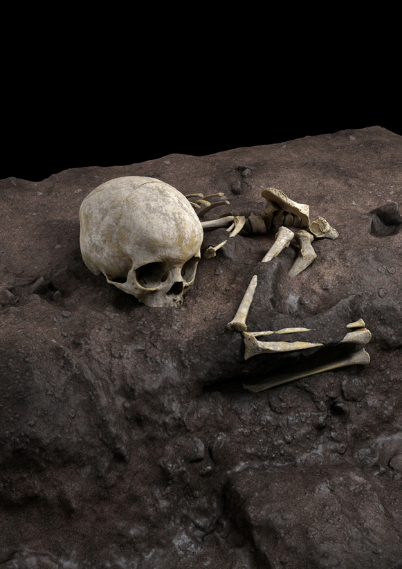 The remains of a child roughly age 3 who lived about 78,000 years ago and was found in a burial pit at a cave site in Kenya called Panga ya Saidi, the oldest-known human burial in Africa, are seen in an undated virtual reconstruction. Jorge Gonzalez/Elena Santos/Handout via REUTERS