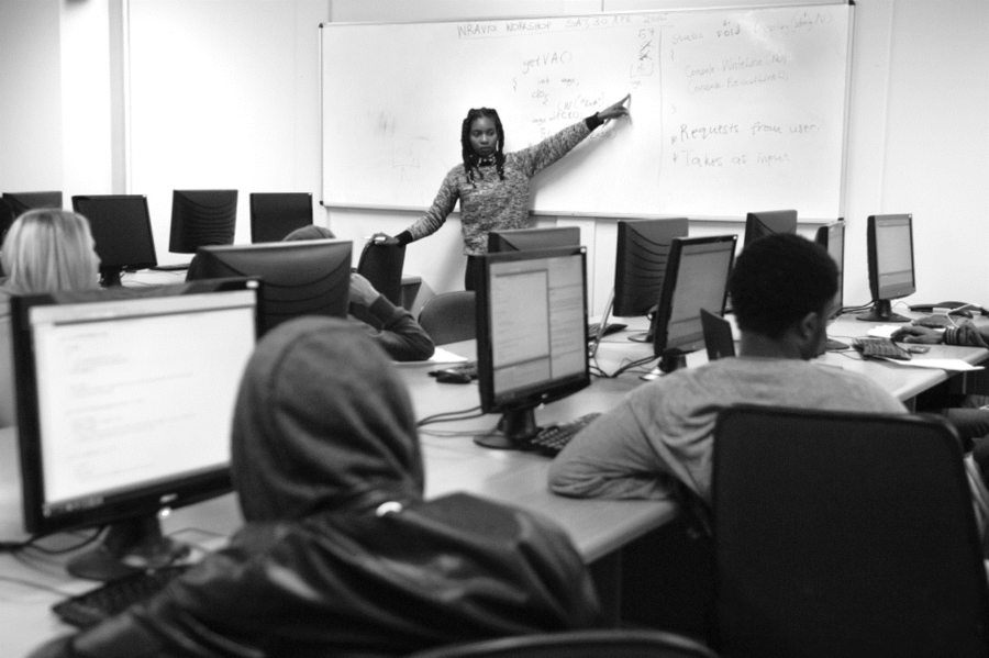 Photo of me tutoring first years, by Leonette Bower