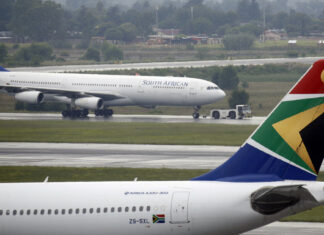 A South African Airways (SAA) plane is towed at O.R. Tambo International Airport in Johannesburg, South Africa, January 18, 2020. REUTERS/Rogan Ward/File Photo