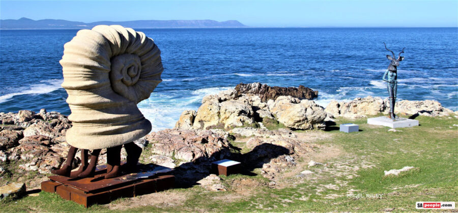 The Hermit Hermanus sculpture on the cliff