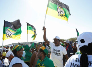 Supporters of former South African President Jacob Zuma walk to his home in Nkandla