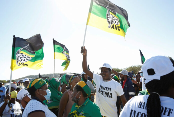 Supporters of former South African President Jacob Zuma sing and dance in front of his home in Nkandla Supporters of former South African President Jacob Zuma walk to his home in Nkandla