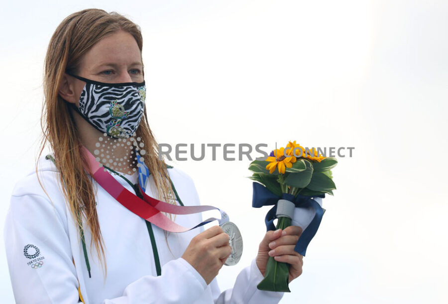Tokyo 2020 Olympics - Surfing - Women's Shortboard - Medal Ceremony - Tsurigasaki Surfing Beach, Chiba, Japan – July 27, 2021. Silver medallist, Bianca Buitendag of South Africa wearing a protective face mask poses on the podium REUTERS/Lisi Niesner