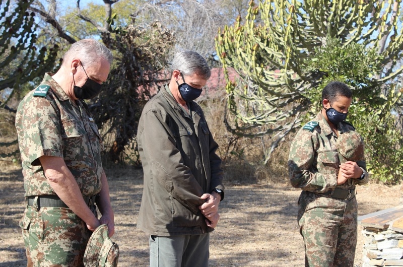 KNP Staff members observe the moment of silence in honour of Rangers who have departed