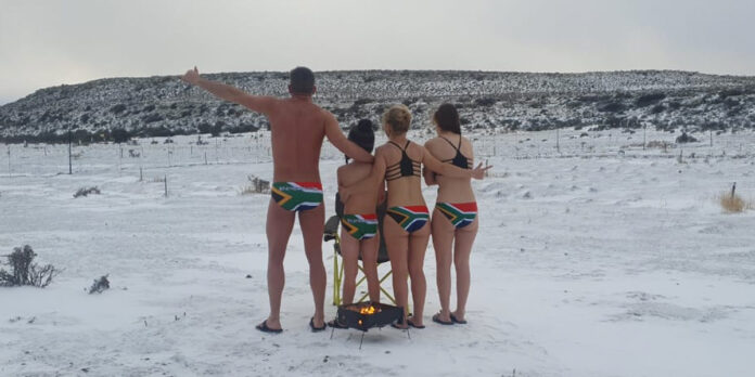 SA-flag-swimming-costumes-in-snow SA-flag-swimming-costumes-in-snow