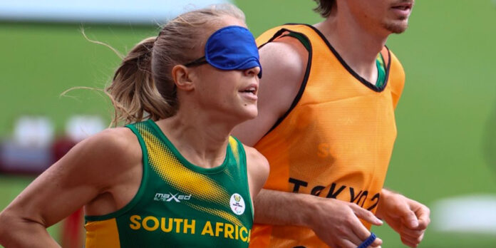 South-Africa-Paralympics-Tokyo Louzanne Coetzee, with her guide Erasmus Badenhorst