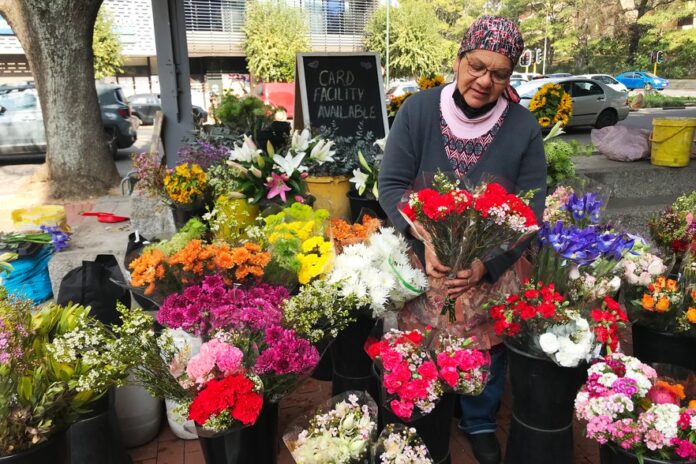 Wadea Tape has been selling flowers in the same place for 40 years. Photo: Ashraf Hendricks