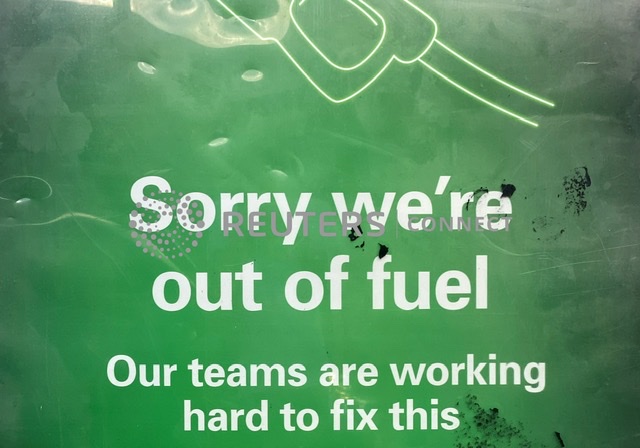 sign is seen at a BP petrol station that has run out of fuel in south London, Britain, September 27, 2021. REUTERS/Toby Melville