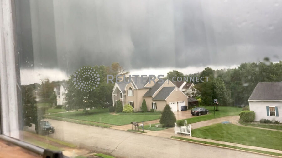 Dark clouds are seen above a neighborhood in New Jersey