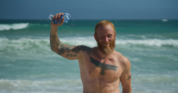 Dewet-du-Toit-Dyer-Island-Last-Shark-Doc Dewet Du Toit Makes History with 'Shark Alley' Swim to Dyer Island for Great White Sharks