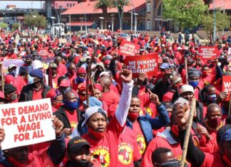 Hundreds of NUMSA workers marched from the Mary Fitzgerald Square to the Metals Engineering Industries Bargaining Council office in Marshalltown to hand over the memorandum of their demands on Tuesday. It was part of the national strike by steel engineering workers who are demanding an 8% wage increase, among other things. Photo: Masego Mafata