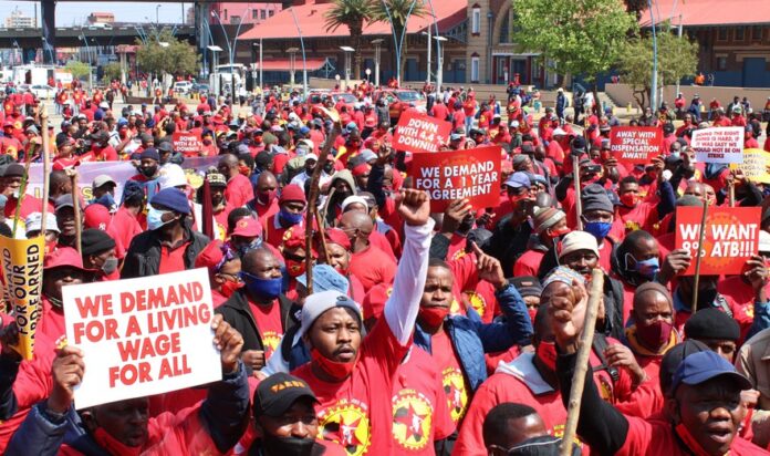 NUMSA workers strike johannesburg gup Hundreds of NUMSA workers marched from the Mary Fitzgerald Square to the Metals Engineering Industries Bargaining Council office in Marshalltown to hand over the memorandum of their demands on Tuesday. It was part of the national strike by steel engineering workers who are demanding an 8% wage increase, among other things. Photo: Masego Mafata