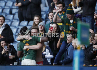 South Africa's Siya Kolisi celebrates with fans after the match Action Images via Reuters/Lee Smith