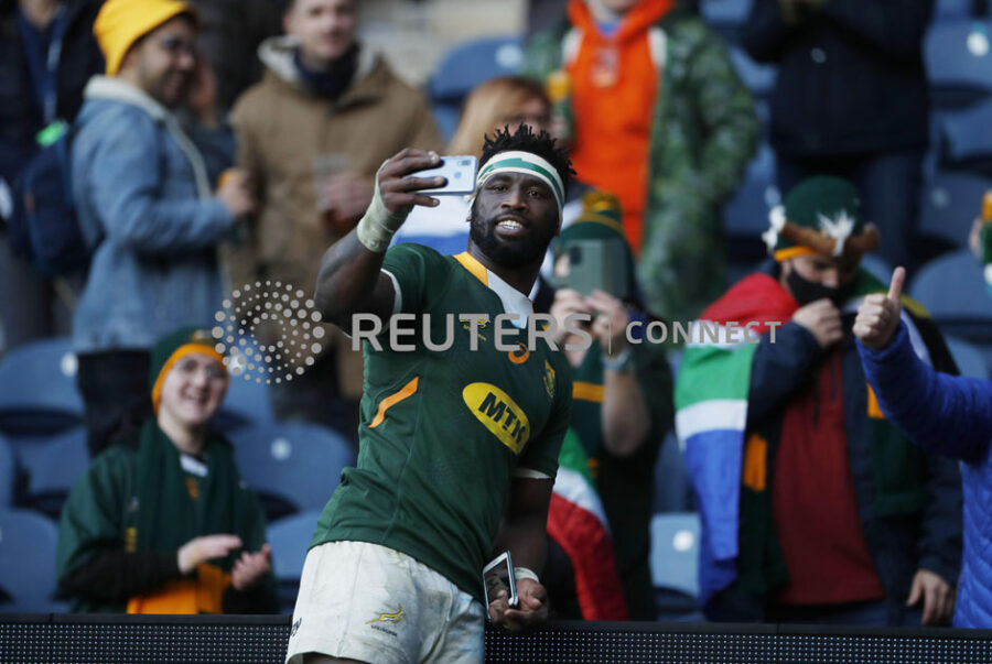 Siya Kolisi takes a selfie as he celebrates with fans after the match Action Images via Reuters/Lee Smith