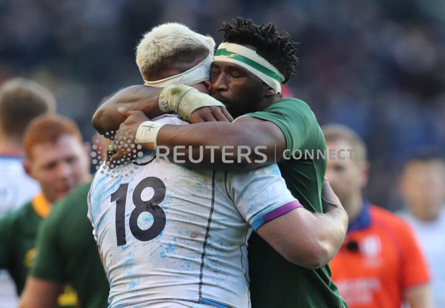 s Siya Kolisi with Scotland's Oli Kebble after the match REUTERS/Russell Cheyne