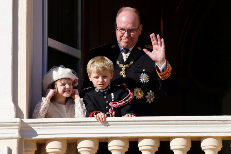 Prince Albert II of Monaco, Prince Jacques and Princess Gabriella stand on the palace balcony during the celebrations marking Monaco's National Day in Monaco, November 19, 2021. REUTERS/Eric Gaillard