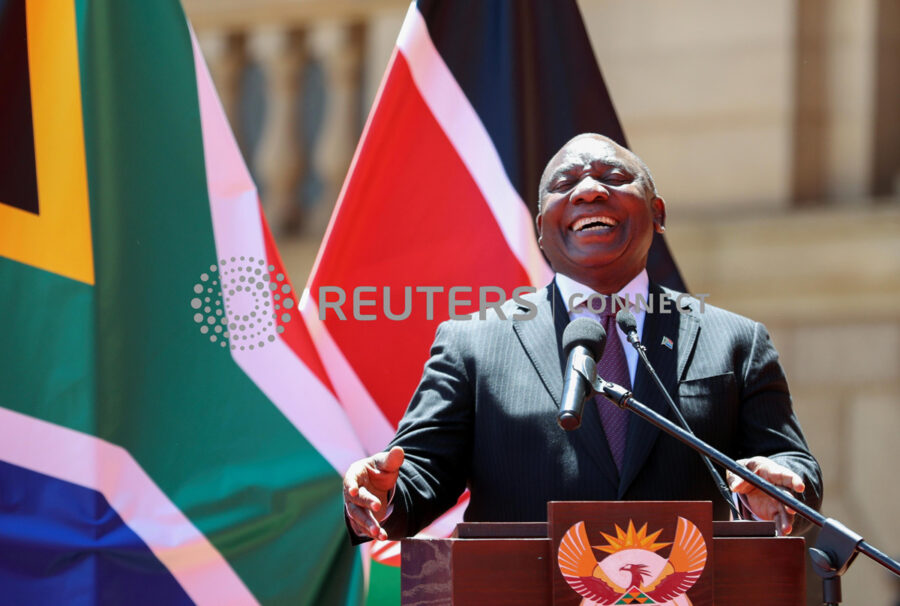 South Africa's President Cyril Ramaphosa reacts as he and Kenya's President Uhuru Kenyatta address members of the media during a state visit, at the government's Union Buildings in Pretoria, South Africa, November 23, 2021. REUTERS/Siphiwe Sibeko