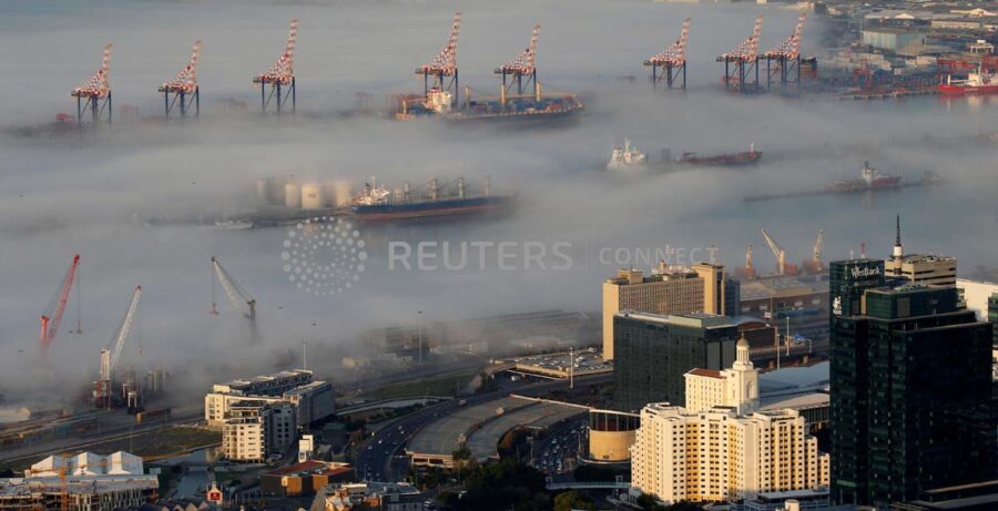 Seasonal fog enshrouds ships docked in Cape Town harbour