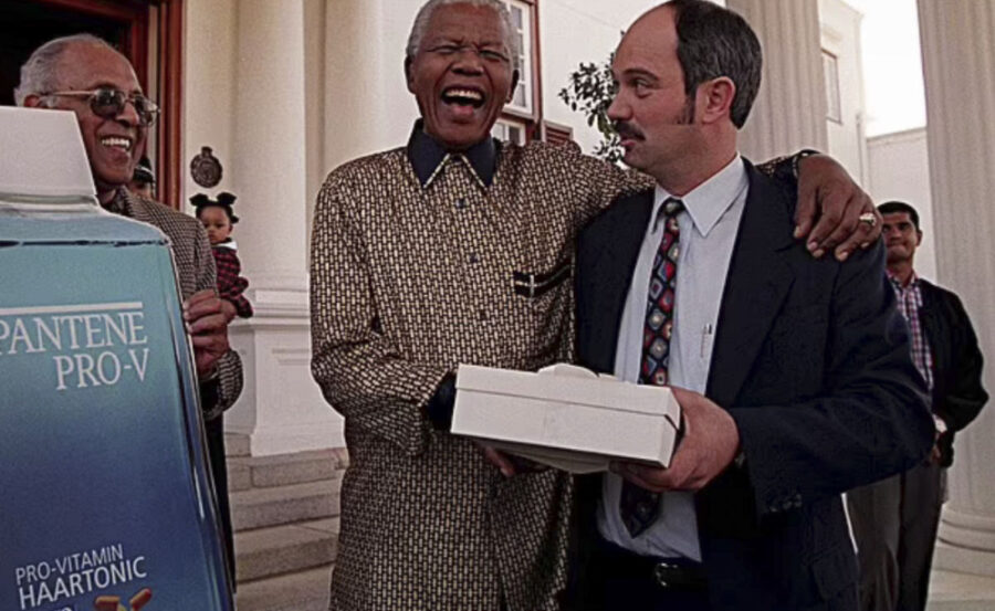 The key was used by the jailer, Christo Brand (pictured with Mandela in 1998), who became his friend, and who is now selling the small metal key more than seven years after Mandela's death.