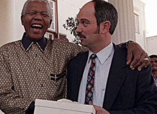 The key was used by the jailer, Christo Brand (pictured with Mandela in 1998), who became his friend, and who is now selling the small metal key more than seven years after Mandela's death. To use text or photos please contact Jamie Pyatt News Ltd - details below.