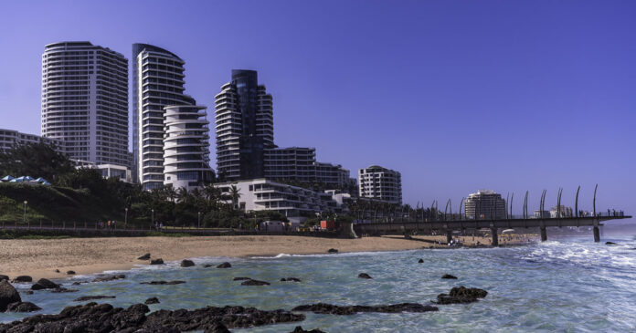 Umhlanga beach and beachfront buildings during summer Fugitive Portuguese Banker Arrested in Umhlanga Rocks, South Africa