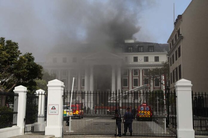 Firefighters work after a fire broke out in the Parliament in Cape Town Fire Parliament Cape Town South Africa