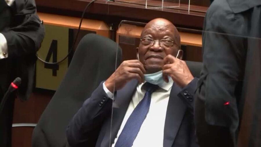Former South African President Jacob Zuma speaks with members of the media before appearing at the High Court in Pietermaritzburg