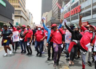 Clover workers, who have been on strike for nearly nine weeks, marched through Johannesburg city centre on Tuesday, calling for a boycott of the company’s products. Photo: Masego Mafata