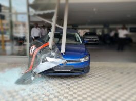 vw motorist drives display window