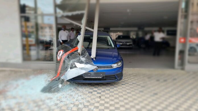 vw motorist drives display window vw motorist drives display window
