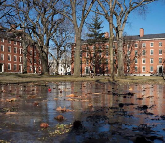 John Comaroff Harvard law suitFILE PHOTO: Buildings in Harvard Yard are reflected in frozen puddle at Harvard University in Cambridge, Massachusetts January 20, 2015. REUTERS/Brian Snyder//File Photo