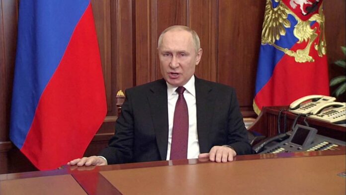 Russian President Vladimir Putin speaks about authorising a special military operation in Ukraine's Donbass region during a special televised address on Russian state TV, in Moscow Russia invades Ukraine