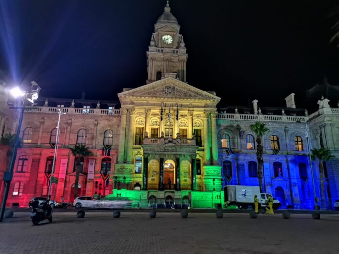 Lighting of the colours of the SA flag last night on the building of the seat of Parliament at the Cape Town City Hall. Photo: Parliament of RSA