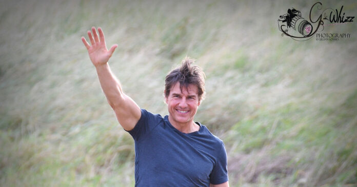 Tom-Cruise-South-Africa-wave-grin-th Tom Cruise Choppers in for Another Day Filming 'Mission: Impossible 8'