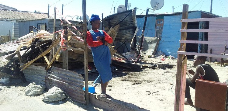 The families of five friends who died when the shack they were sleeping in burnt down in Khayelitsha on Friday morning say they are devastated by their deaths. Siviwe Xhalanga (pictured above) lost her sister and cousin in the fire. Photo: Nombulelo Damba-Hendrik