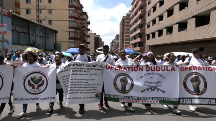 Anti-migrant vigilante group Dudula stokes tensions in South Africa Operation Dudula: Hundreds of Anti-Migrants March Through Hillbrow to 'Take Back South Africa'