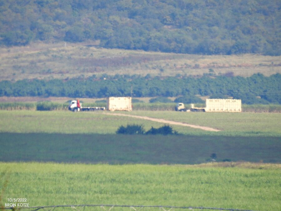 Relocation trucks on Riverside Farm