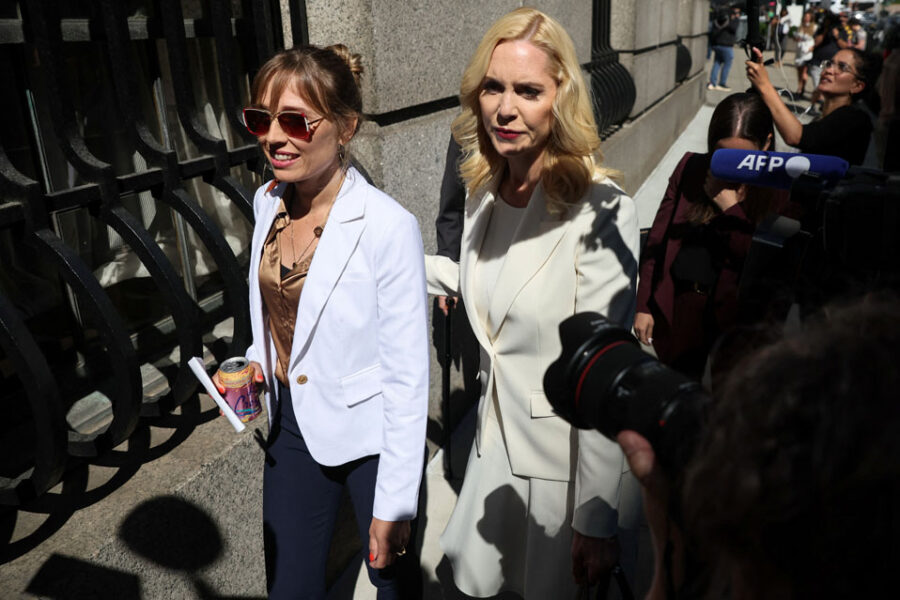 Annie Farmer, a victim of Jeffery Epstein, arrives with lawyer Sigrid McCawley for the sentencing of the Ghislaine Maxwell trial in the Manhattan borough of New York City