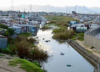 Residents say blockages in this canal caused the water to flood homes. Photos: Vincent Lali