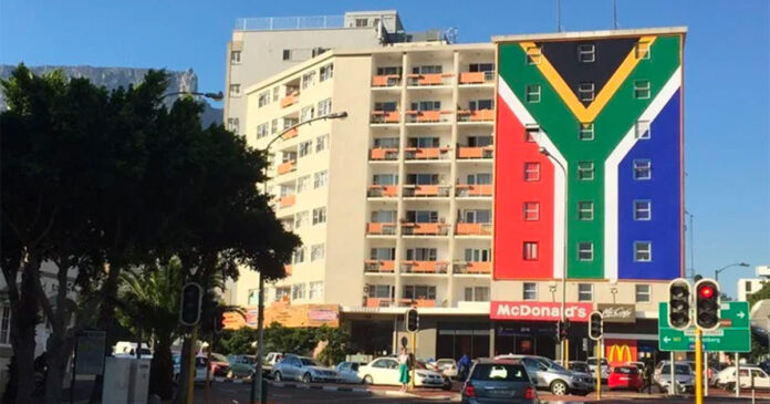 South-African-flag-signage After the “Zuma must fall” sign was taken down, the South African flag was put up. This stayed for nearly three years. Photo supplied