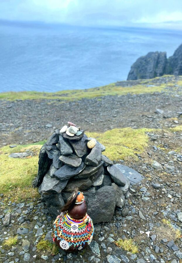 African flair on the cliffs of Nordkapp in Norway: the Defender Transcontinental Expedition team built an 'isivivane' topped with pebbles from Cape Agulhas and symbolically carried a traditional Zulu calabash filled with seawater from the southern tip of Africa.