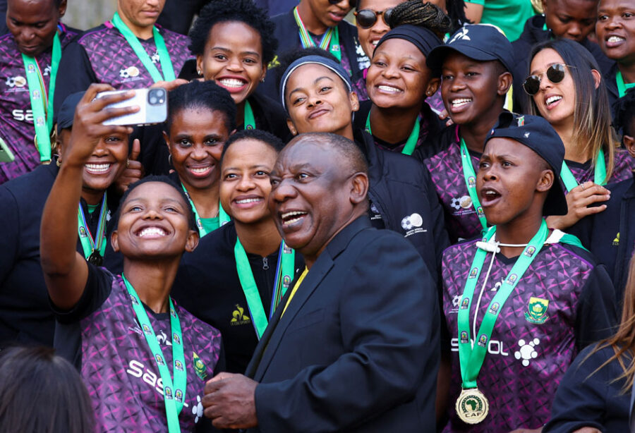 South African women's soccer team players take a selfie with President Cyril Ramaphosa as they celebrate winning their first Women's Africa Cup of Nations title in Morocco, at the at the government's union building in Pretoria, South Africa, July 27, 2022. REUTERS/Siphiwe Sibeko