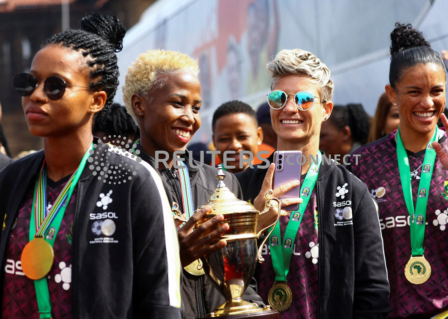 South African women's soccer team celebrate win with President Ramaphosa following historic win